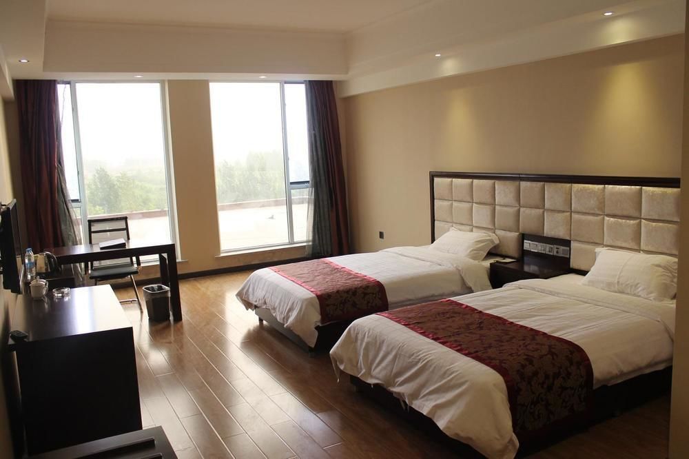 Weishi International Hotel Qingzhou Bagian luar foto